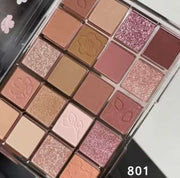 Palette de Maquillage with vibrant shades and a variety of finishes, ideal for creative makeup looks.