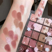 Palette de Maquillage showcasing swatched vibrant colors on skin, featuring rich matte and shimmer finishes.